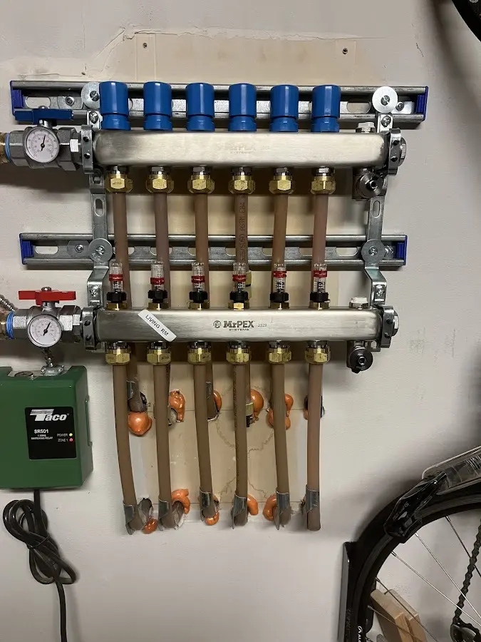 Plumber performing Sink Repair at a residential property in Newington